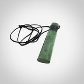 This photo shows a large jade drop shaped pendant. It a a lovely deep green Marsden jade. The cord is black and is adjustable in length. One only large, contemporary drop necklace from Jade, by Rueben Tipene.